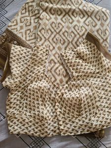 Elegant Cream and Brown Saree