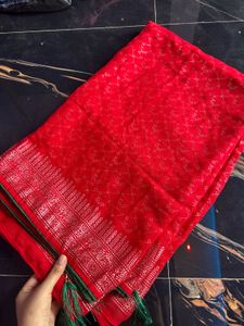 Vibrant Red Saree with Intricate Silver Weave