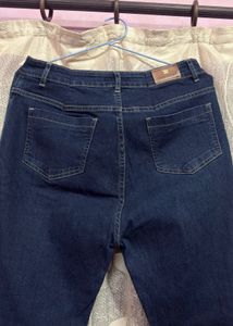 Flared Denim Jeans with Rhinestone Detail