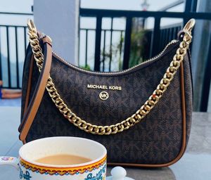 Original Michael Kors Dark Brown Convertible.