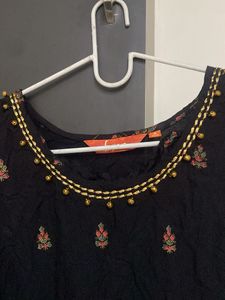 Elegant Black Kurta with Embellished Neckline