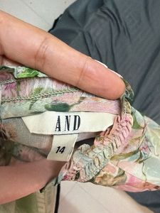 Sheer Floral Peplum Top