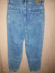 Distressed Blue Denim Jeans
