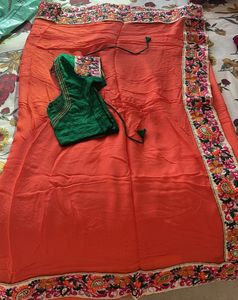 Vibrant Orange Embroidered Saree with Green Blouse