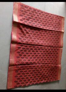 Beautiful Red Saree with Intricate Black Motifs