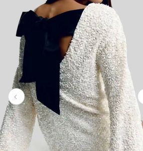Sparkling Sequin dress with Black Ribbon Detail