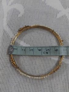 Elegant Gold Tone Bangles with Pearl Accents