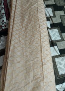 Elegant Peach Saree with Intricate Weave