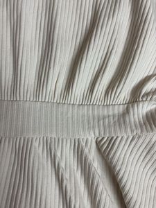 Cream Textured Peplum Top