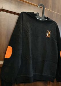 Black Crew Neck Sweatshirt with Orange Accents