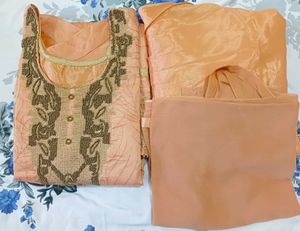 Elegant Peach Kurta Set with Intricate Embroidery