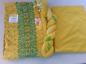 Yellow Cotton dress material with Green Embroidery