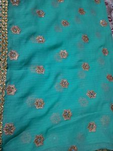 Stunning Teal Embellished Saree