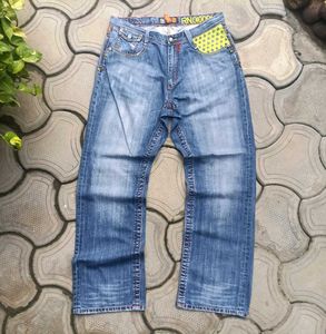 Stylish Blue Denim Jeans with Yellow Accents