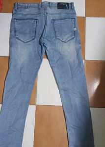 Light Wash Distressed Denim Jeans