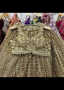 Stunning Gold Sequined Lehenga Choli