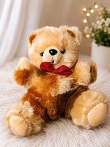 Cute Teddy Bear with Red Bowtie