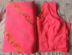 Vibrant Pink Saree with Sleeveless Blouse