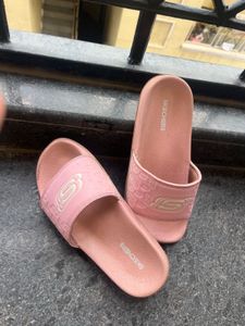 Pink Skechers Slides