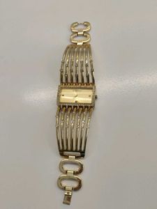 Elegant Gold Tone Watch with Rhinestones