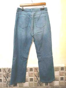 Distressed Blue Denim Jeans