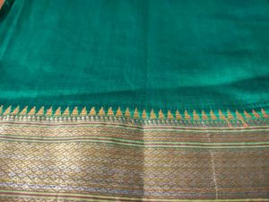 Elegant Teal Saree with Golden Border