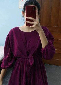 A beautiful decent purple top with florry sleeves