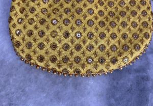 Embellished Yellow Potli Bag