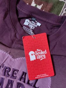 Purple "We're All Mad Here" Graphic Tee