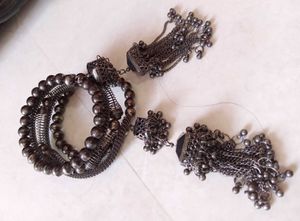 Trendy Silver Tone Bangle & Earrings Set