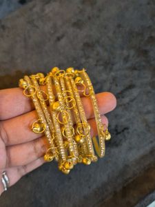 Gold Tone Bracelet Set with Charms