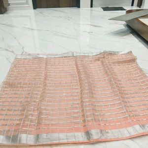peach colour organza saree with designer blouse