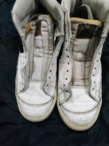 Nike Worn White High-Top Sneakers