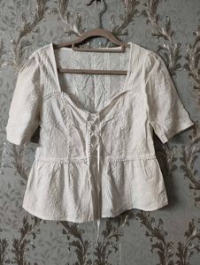 Chic White Lace-Up Peplum Top