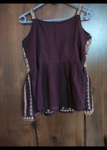 Embroidered Peplum Top