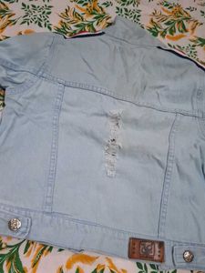 Light Wash Distressed Denim Jacket