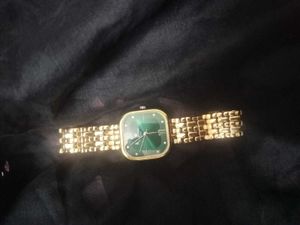 Elegant Gold &amp; Green Carlton Watch
