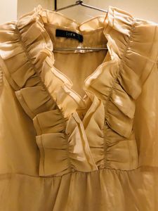 RUFFLE TOP BY IORA IN L