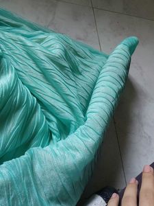 Elegant green Saree with Gold Border