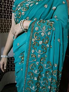 Elegant Teal Embroidered Saree
