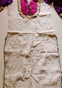 Elegant Beige Saree with Subtle Motifs