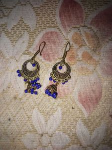 Blue Silling Bag With Matching Earrings.