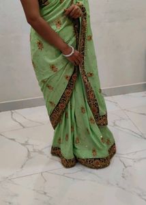 heavy party wear saree Light Green Embellished