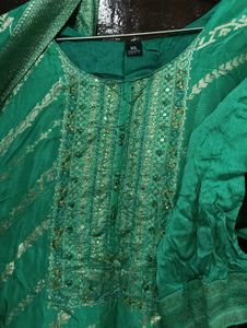 Elegant Green Saree with Gold Floral Print