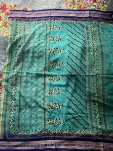 Teal Saree with Floral Motifs