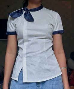 Professional White Blouse with Navy Necktie Trim