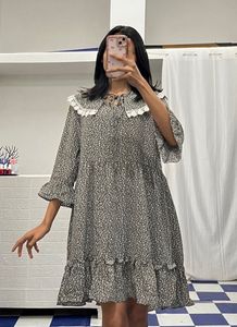 Chic Printed Mini Dress with Lace Collar