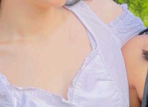 White Cotton Blouse with Smocked Details