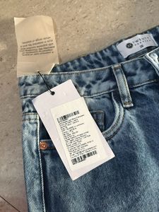 Distressed Blue Denim Jeans