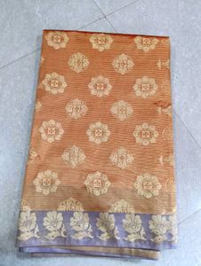 Orange Saree with Brocade Blouse